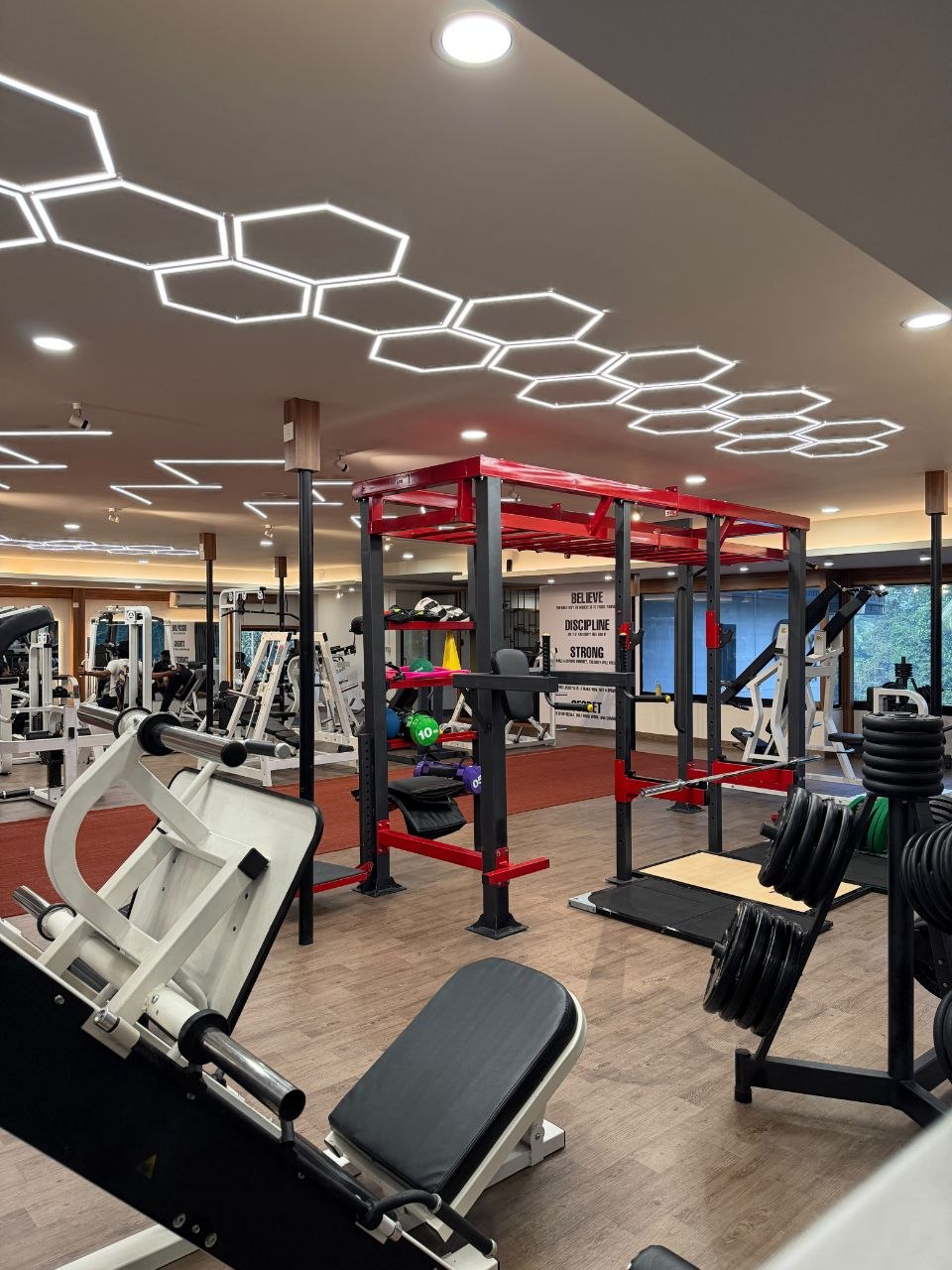Inside Liger Fitness Chelavoor - training area and premium equipment