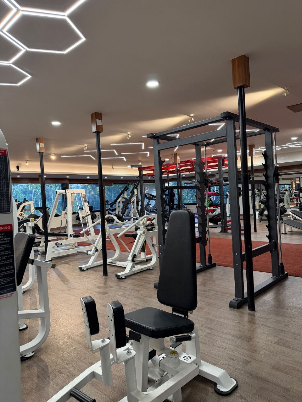 Inside Liger Fitness Chelavoor - training area and premium equipment