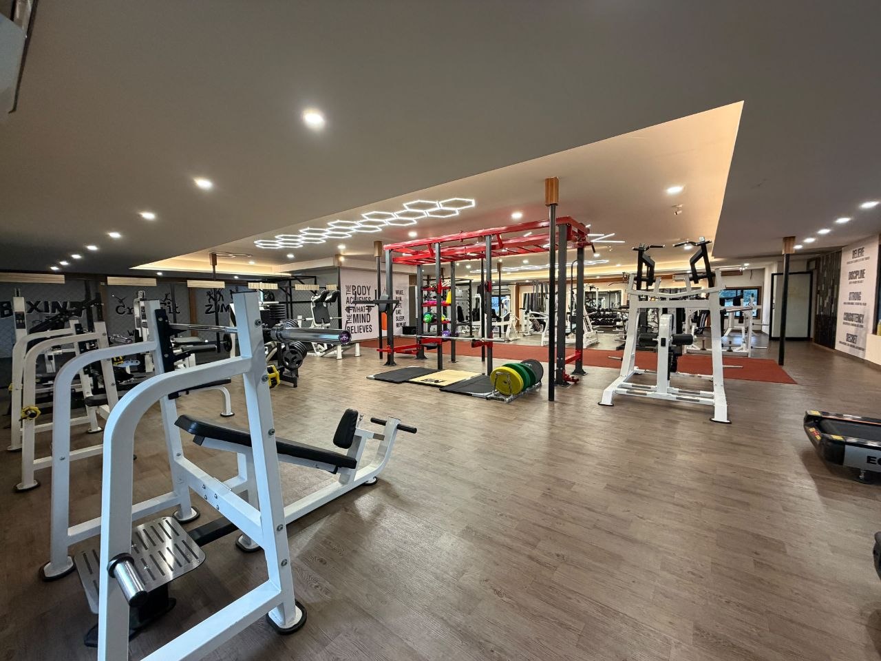 Inside Liger Fitness Chelavoor - training area and premium equipment